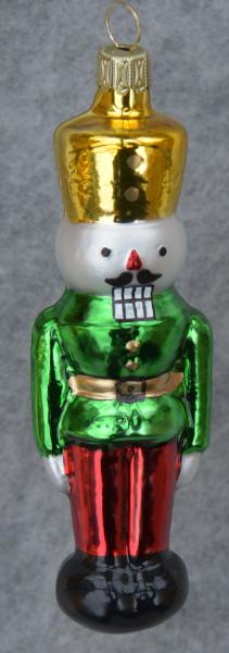 Nußknacker grüne Jacke, rote Hose, goldener Hut